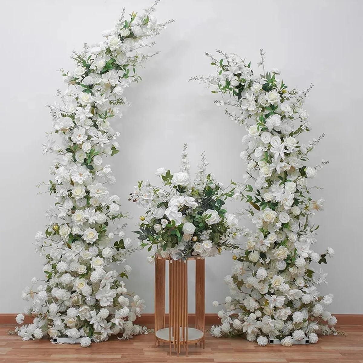 White floral arrangements with greenery